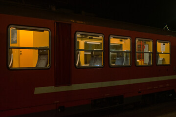 Old vintage train on the train station at night