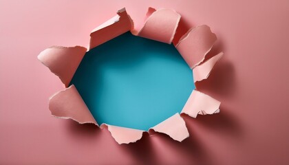Torn pink paper reveals teal background. Abstract texture.