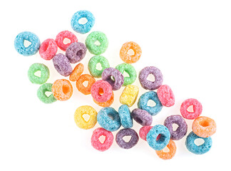 Colorful corn rings isolated on a white background, top view. Food concept. Breakfast cereals.