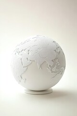 Minimalist white globe depicting world continents, perfect for modern decor and educational purposes.