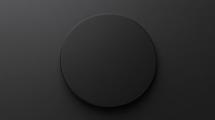 Overhead shot of a round black plate on a dark background with copy space.