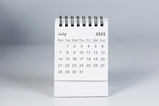 Minimalistic photo of a desk calendar displaying February 2025. Clean and professional design, suitable for topics like planning, organization, and productivity.