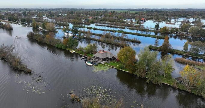 loosdrechtse plassen, water village, house on water, nature of The Netherlands. Breukelen, Scheendijk, aerial drone view.