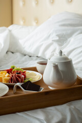 A view of a catered breakfast in bed tray.