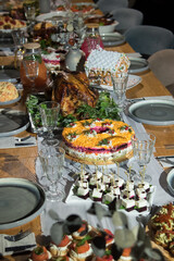 Herring salad with a fur coat on a festive table, side view