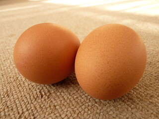 Brown Eggs on a Soft Fabric Surface: A Natural and Inviting Food Photography