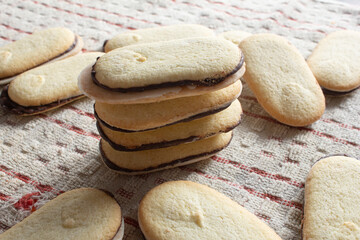 A view of a stack of mint chocolate sandwich cookies.