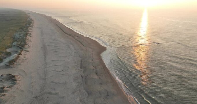 Couple walking on the beach at sunset, relationships, couples, love.