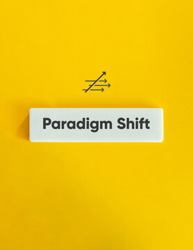 Paradigm Shift Term. Fundamental Change in Approach. Icon and Text on Block Letter Tile on Yellow Background. Minimal Aesthetic.