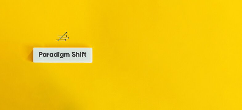 Paradigm Shift Term. Fundamental Change in Approach.
Text on Block Letter Tile on Yellow Background. Minimal Aesthetic.