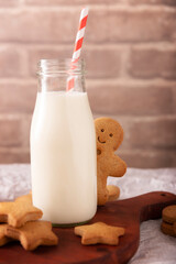 Gingerbread man cookies and milk, traditionally made at Christmas and the holidays.