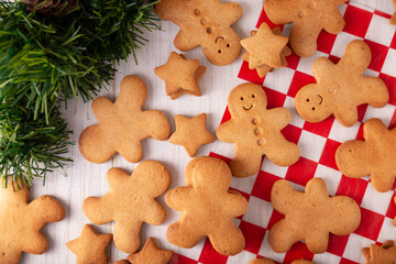 Homemade gingerbread man cookies and milk, traditionally made at Christmas and the holidays.