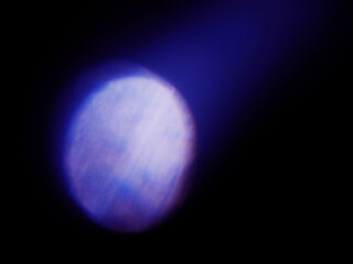 Colorful light leak on dark background. Cinematic visual lens effect for design and creative ideas. Abstract wall paper.