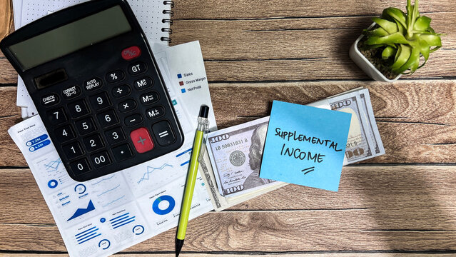 Concept of Supplemental Income write on sticky notes isolated on Wooden Table.