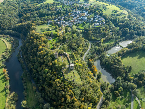 Aerial view of Blankenberg Stadt with city walls, city gate and castle restored medieval village with hilltop castle above the Sieg river in Germany