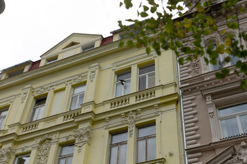 The historic buildings facade showcases decorative windows and intricate architectural details