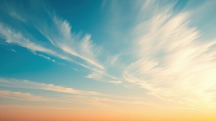 Fototapeta premium Blue morning sky with wispy stratocumulus clouds drifting lazily across the horizon, natural beauty, peaceful mornings, morning skies, serene landscapes