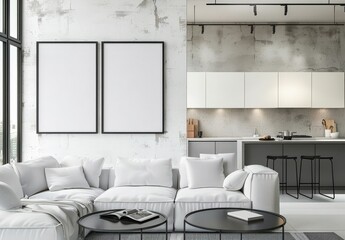 A modern living room with a white sectional sofa. two large framed posters. and a coffee table with magazines The kitchen is visible in the background