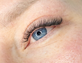 Close up of eye with eyelash extensions ,beauty salon treatment