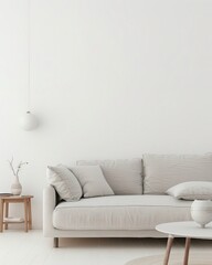 Minimalist living room with a white sofa. a throw blanket. and a vase with dried flowers on a side table The room is bathed in natural light
