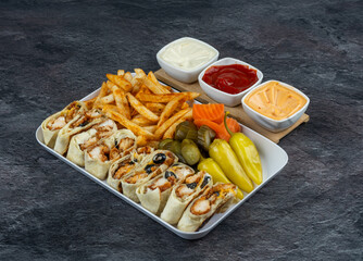 Arabic zinger meal with potatoes, ketchup and mayonnaise
