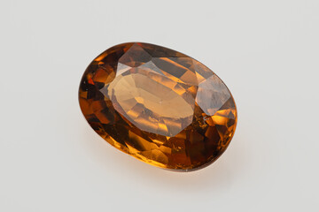 Stunning Natural Zircon Gemstone with Rich Amber Hues and Faceted Brilliance