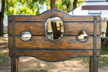 Medieval wooden pillory in a park