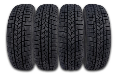 Four new winter tires for a passenger car on an isolated background.

