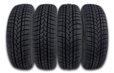 Four new winter tires for a passenger car on an isolated background.
