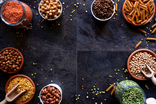 Selection of dried and canned legumes, and pasta made from legumes for plant-based whole food diet. - Powered by Adobe