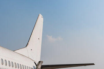 Close up of Passenger airplane wing with blue sky stock photo. Side view. © ReeVisuals