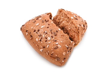 Fitness bread. Broken loaf of organic bran bread with seeds and sesame isolated on white background. Assortment of bakery products.	
