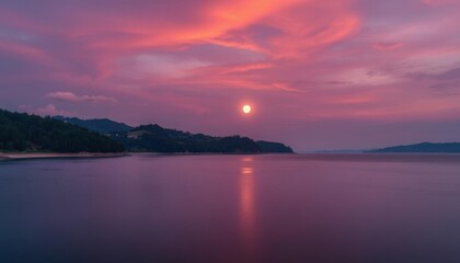 a view of a sunset over a lake