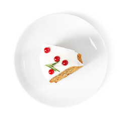 Piece of traditional Christmas cake decorated with red currants and rosemary isolated on white, top view