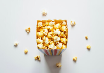 Fresh popcorn in a paper box ready for a movie night snack