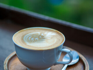 Fresh coffee in the morning at Ban Mae Kampong Village Surrounded by forest and rainforest areas in Chiang Mai, Thailand.