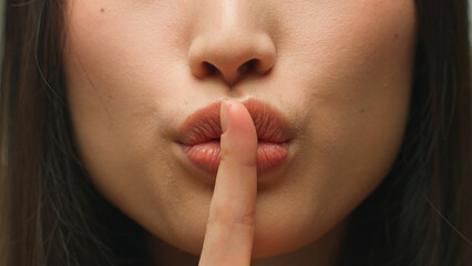 Silence gesture extreme close up female mouth Asian chinese korean japanese woman unrecognizable...