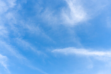 Low angle view and full frame of beautiful blue sky with strange shape of clouds in the morning or evening in sunny day used as natural background texture in decorative art work