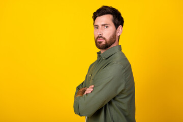 Profile photo of nice young man empty space ad wear shirt isolated on yellow color background