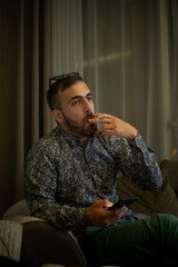 man smoking a ciggarette