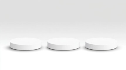 Three White Cylindrical Platforms In A Row