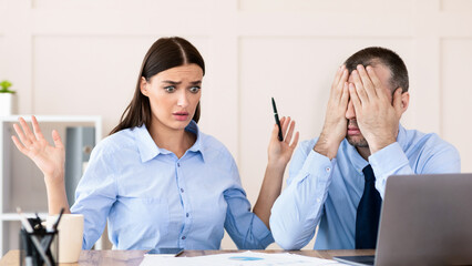 Professional Incompetence. Businessman Covering Eyes Unable To Train Silly Intern Girl Sitting In...