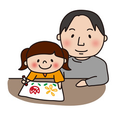 お絵描きをする娘と見守るパパ