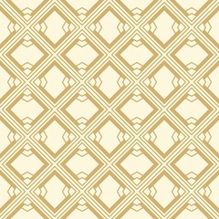 geometric seamless pattern in gold color for textile, carpet, wallpaper and fabric