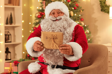 Santa Claus with letters at Christmas night