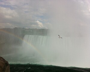 rainbow over Niagara Falls in summer