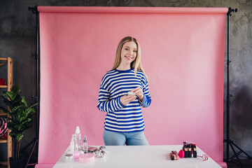 Photo of charming attractive girl professional blogger cosmetics products review live stream video...