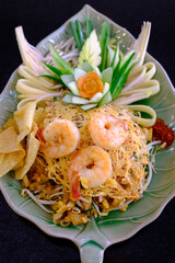 Pad Thai with shrimp on  the table