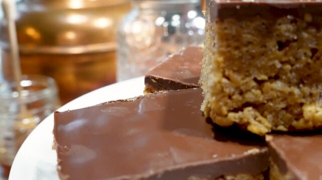Baking rice krispy treats with butterscotch and chocolate on top. Fun chocolate sweet treats for grown ups and kids.  Chocolate rice krispy treats.