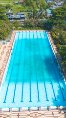 Top view of swimming pool with blue water